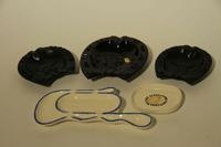 A Collection of Commemorative Haeger Pottery Ash Receivers Width of widest 13 inches.