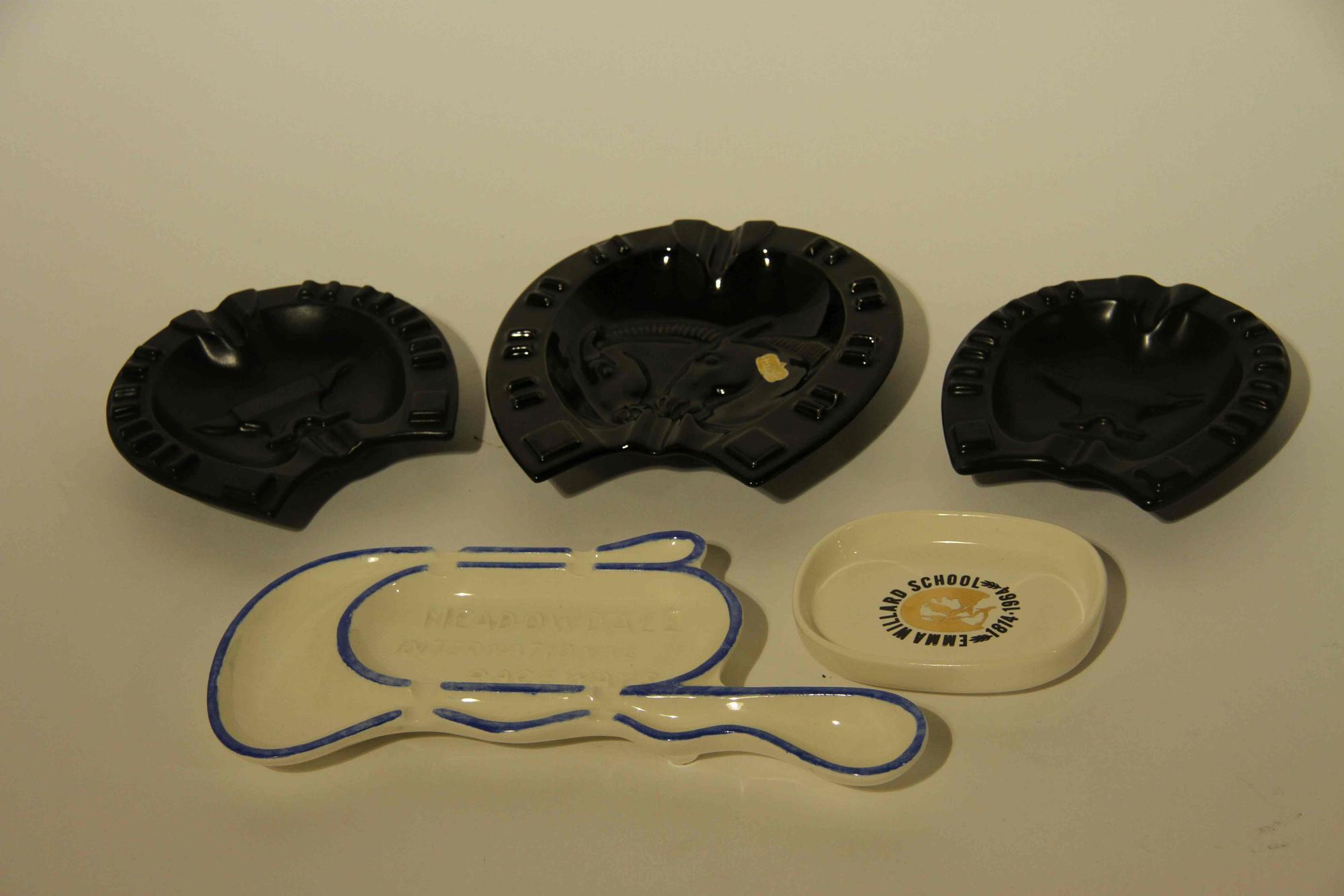 A Collection of Commemorative Haeger Pottery Ash Receivers Width of widest 13 inches.
