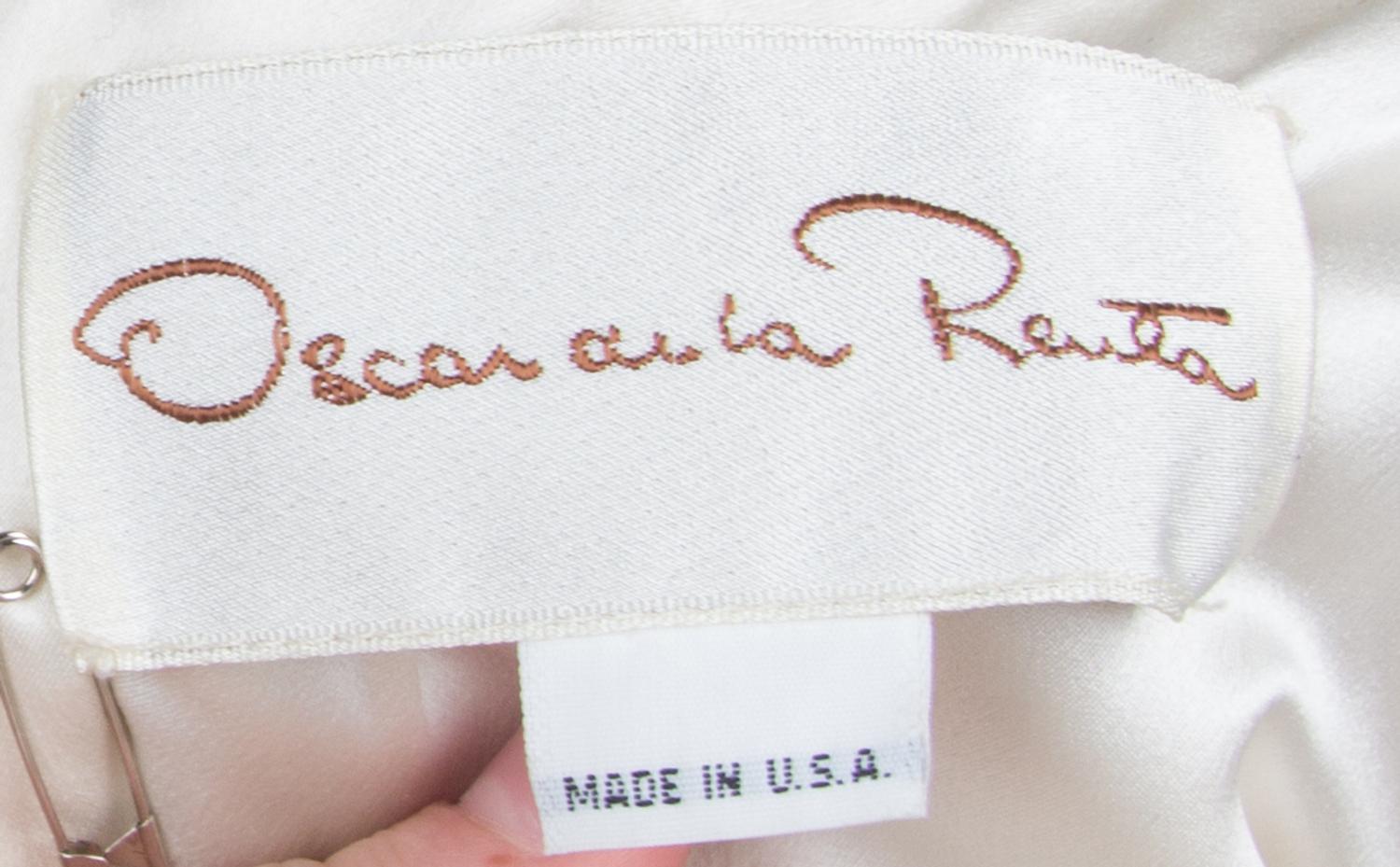 An Oscar de la Renta Silver Sequin Cocktail Dress,