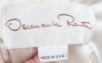 An Oscar de la Renta Silver Sequin Cocktail Dress,