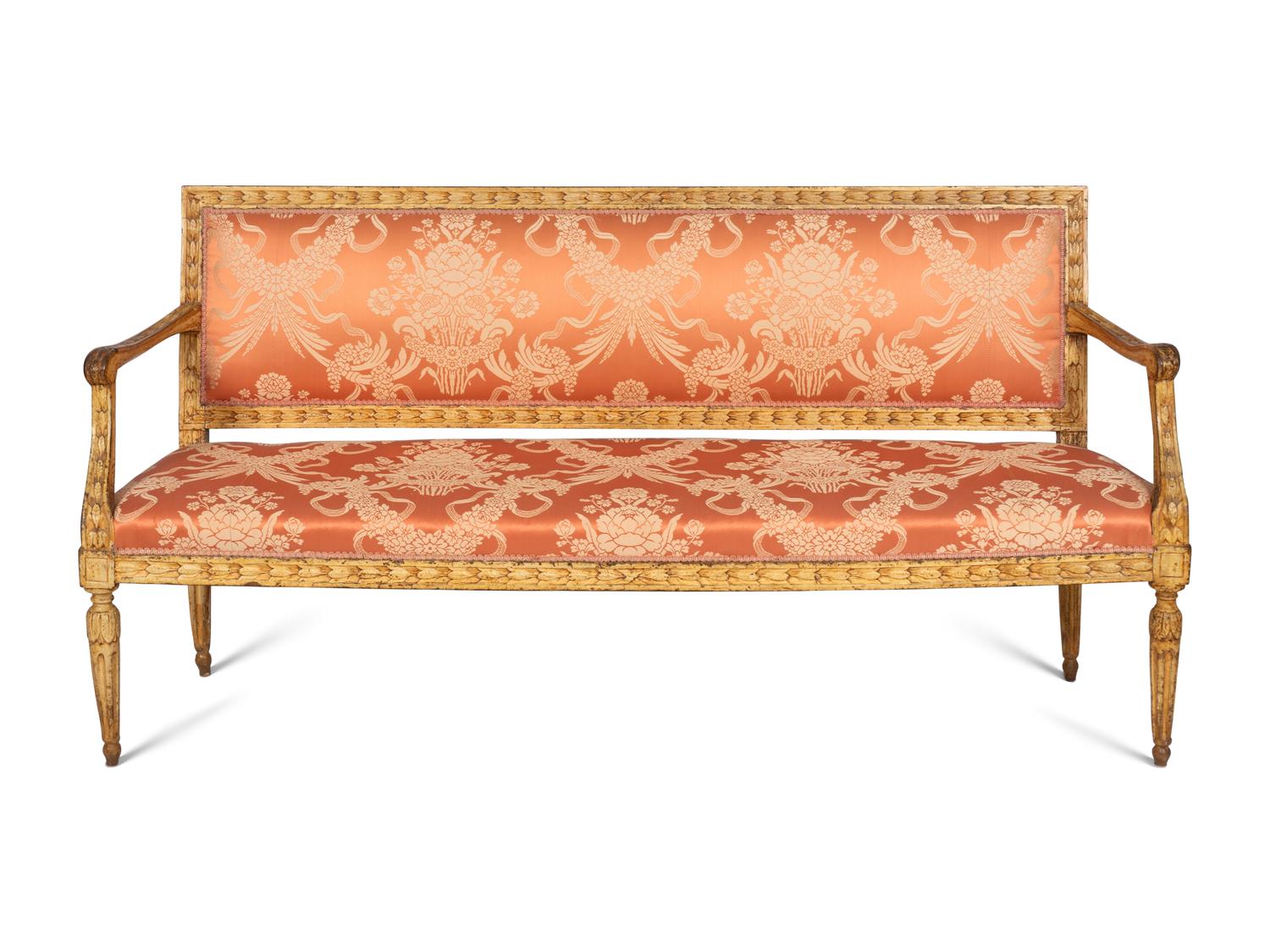 A Near Pair of Italian Neoclassical Cream-Painted Sofas