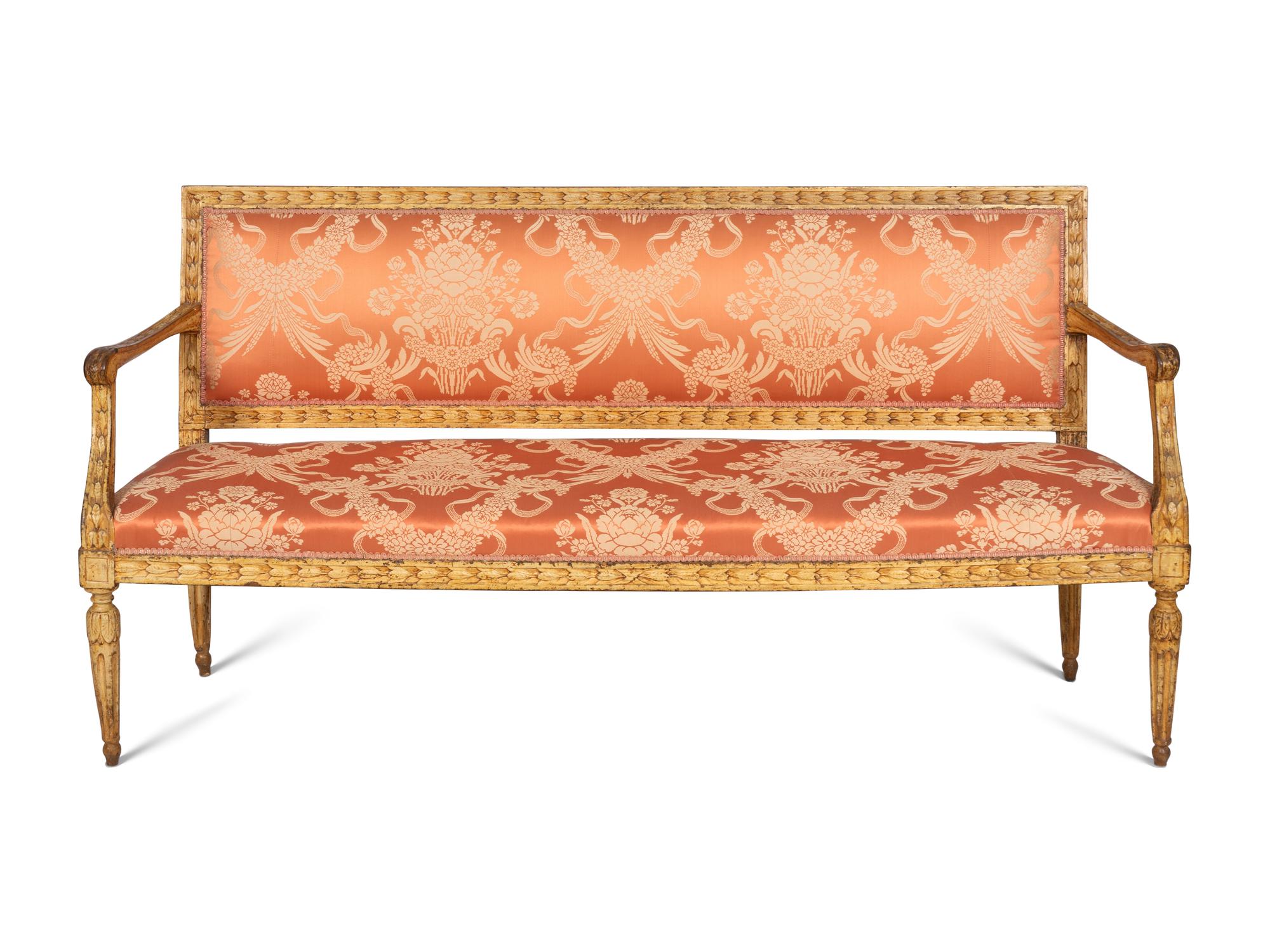 A Near Pair of Italian Neoclassical Cream-Painted Sofas