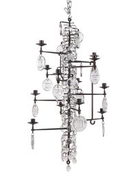 A Swedish Wrought Iron and Molded Glass Twelve-Light Chandelier