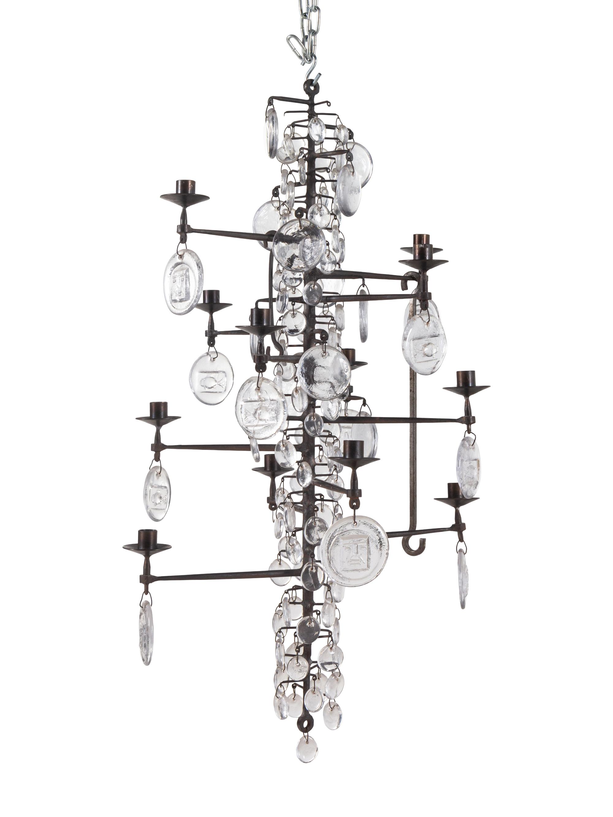 A Swedish Wrought Iron and Molded Glass Twelve-Light Chandelier