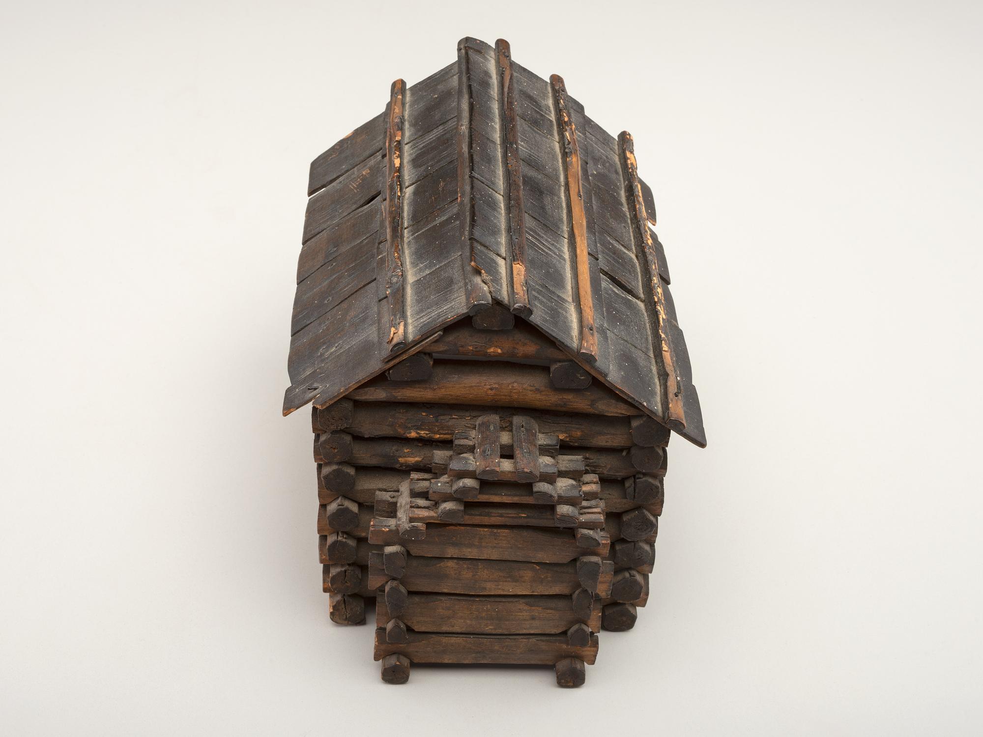 [LINCOLN, Abraham (1809-1865)]. Folk art log cabin depicting Abraham Lincoln's birthplace.