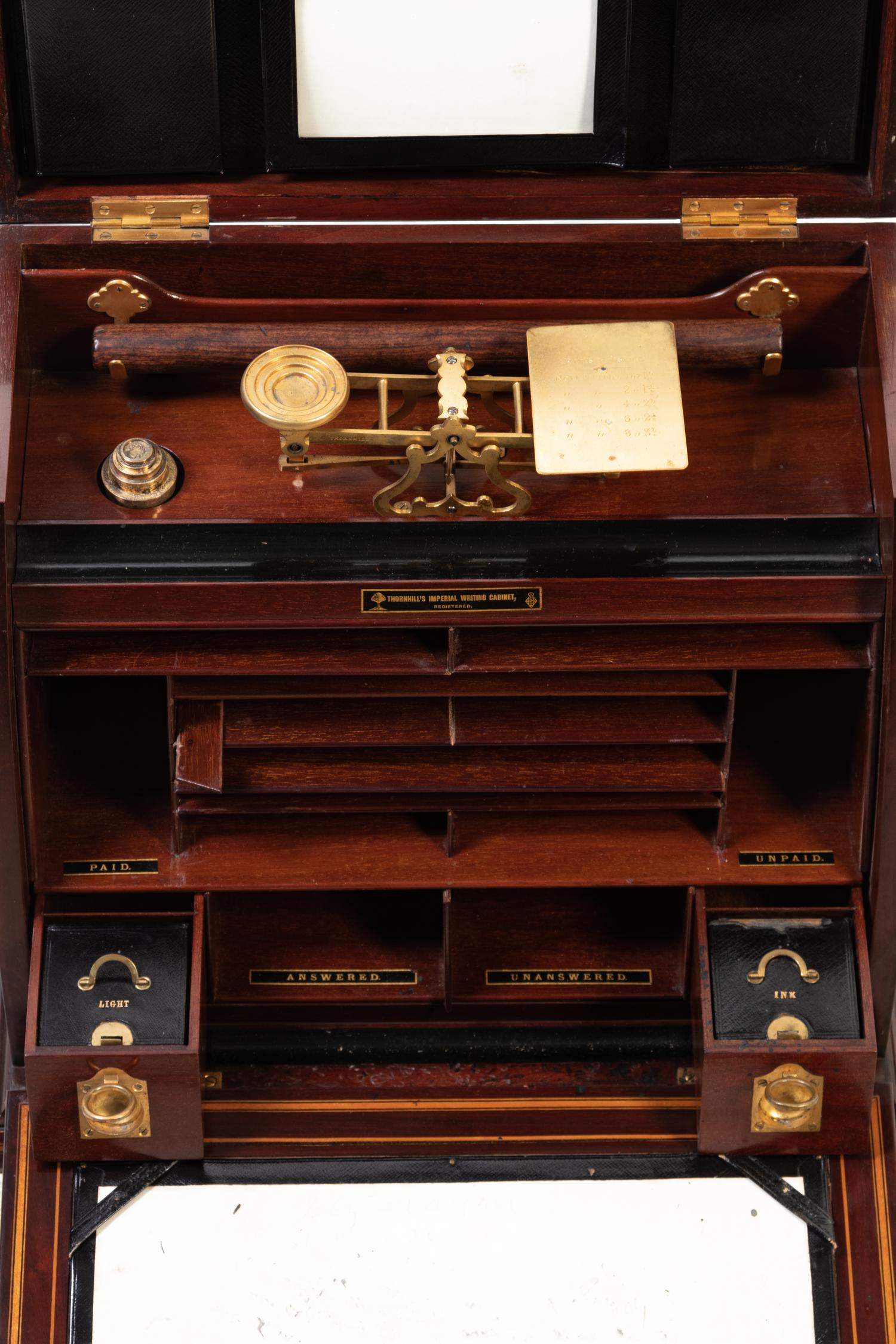 An English Brass-Mounted Mahogany Thornhill's Imperial Writing Cabinet