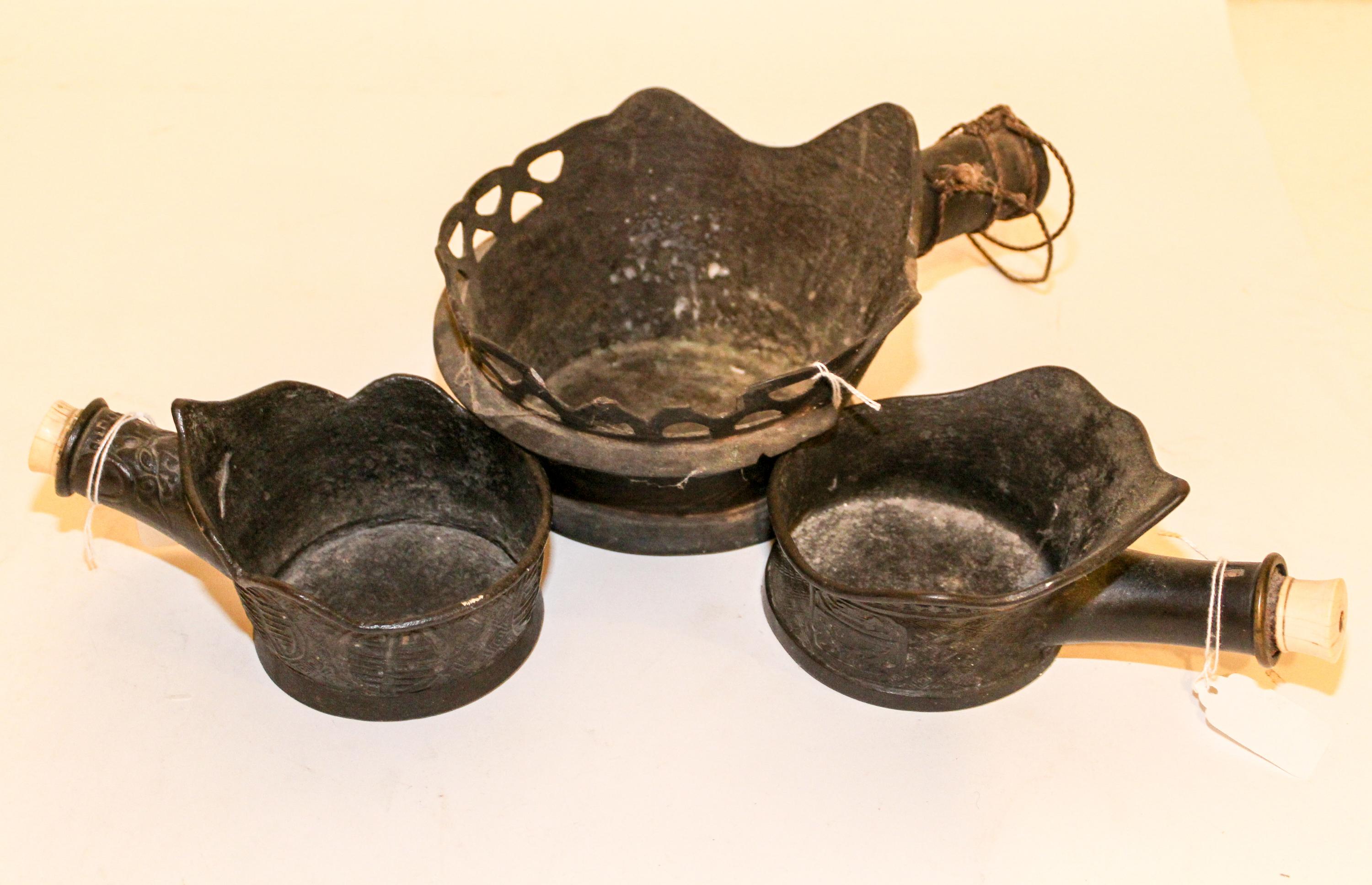 A Group of Three Silk Irons Width over handle of largest 10 3/4 inches.