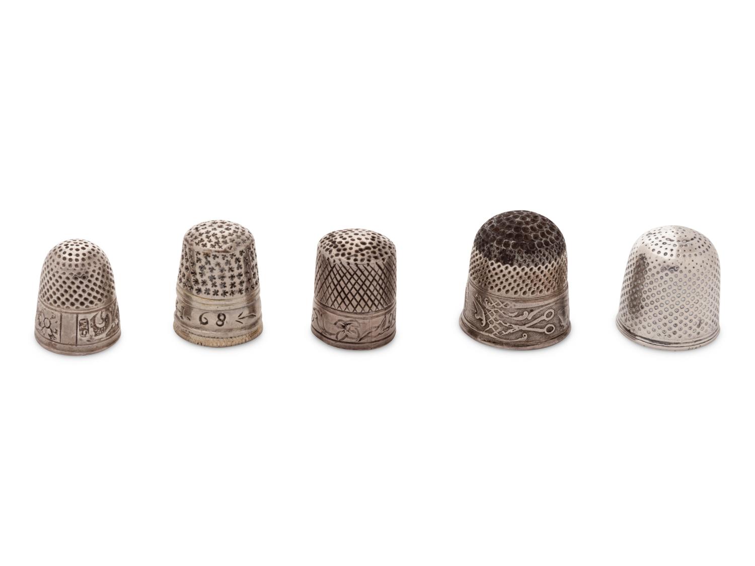 A Group of Five Silver Children's Thimbles