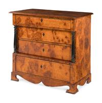 A Biedermeier Part-Ebonized Burlwood Commode