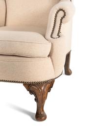 A Pair of Queen Anne Style Wingback Armchairs