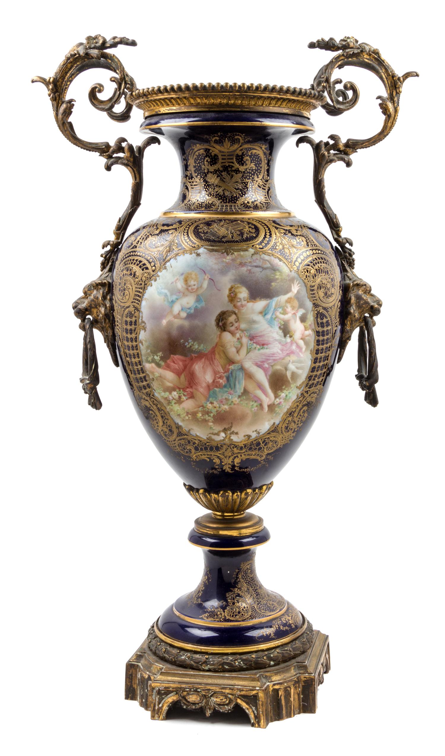 A Sevres Style Gilt Bronze Mounted Porcelain Urn Height 32 inches.