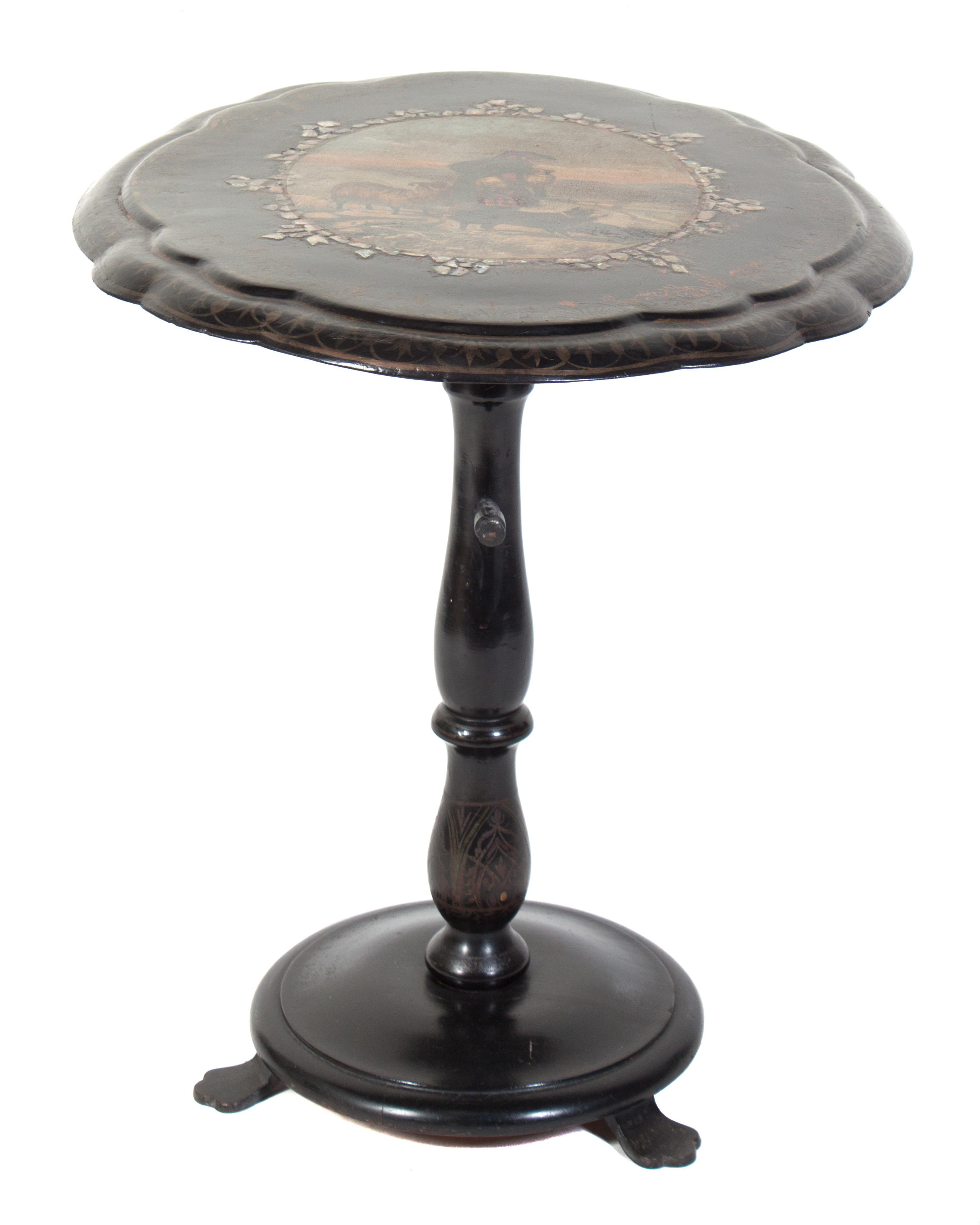 An Ebonized and Parcel Gilt Hand Painted Tilt-Top Table Height 42 inches.