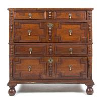 A Charles II Oak Chest of Drawers Height 37 1/2 x width 37 3/8 x depth 22 3/4 inches.