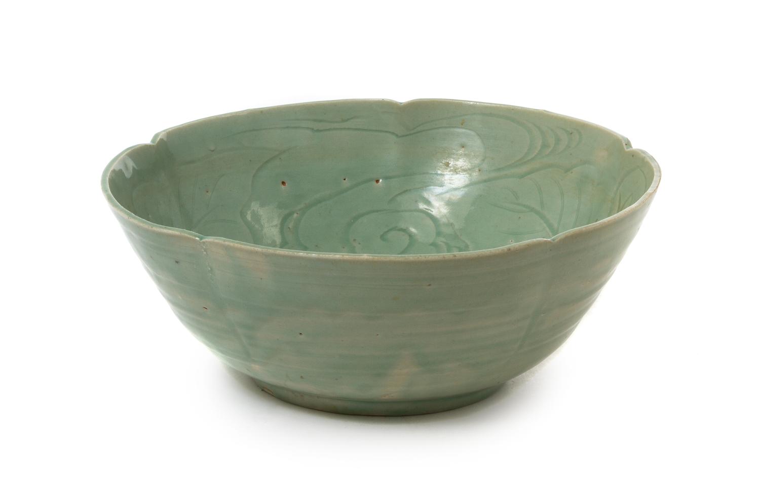 A Japanese Hizen Celadon Glazed Porcelain Bowl POSSIBLY 17TH CENTURY Diameter 13 inches. — POSSIBLY 17TH CENTURY