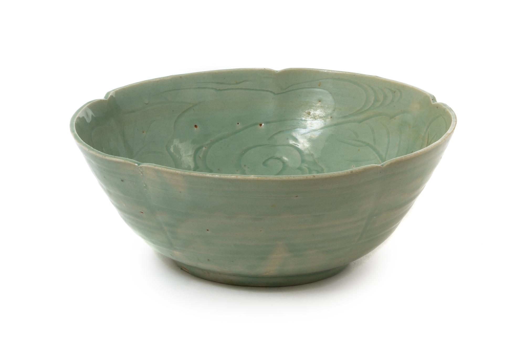 A Japanese Hizen Celadon Glazed Porcelain Bowl POSSIBLY 17TH CENTURY Diameter 13 inches. — POSSIBLY 17TH CENTURY