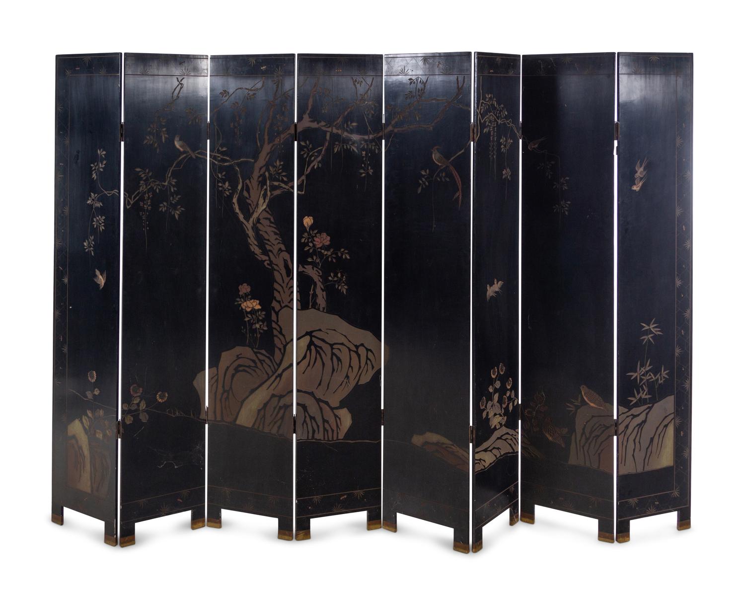 A Coromandel Lacquer Eight-Panel Floor Screen