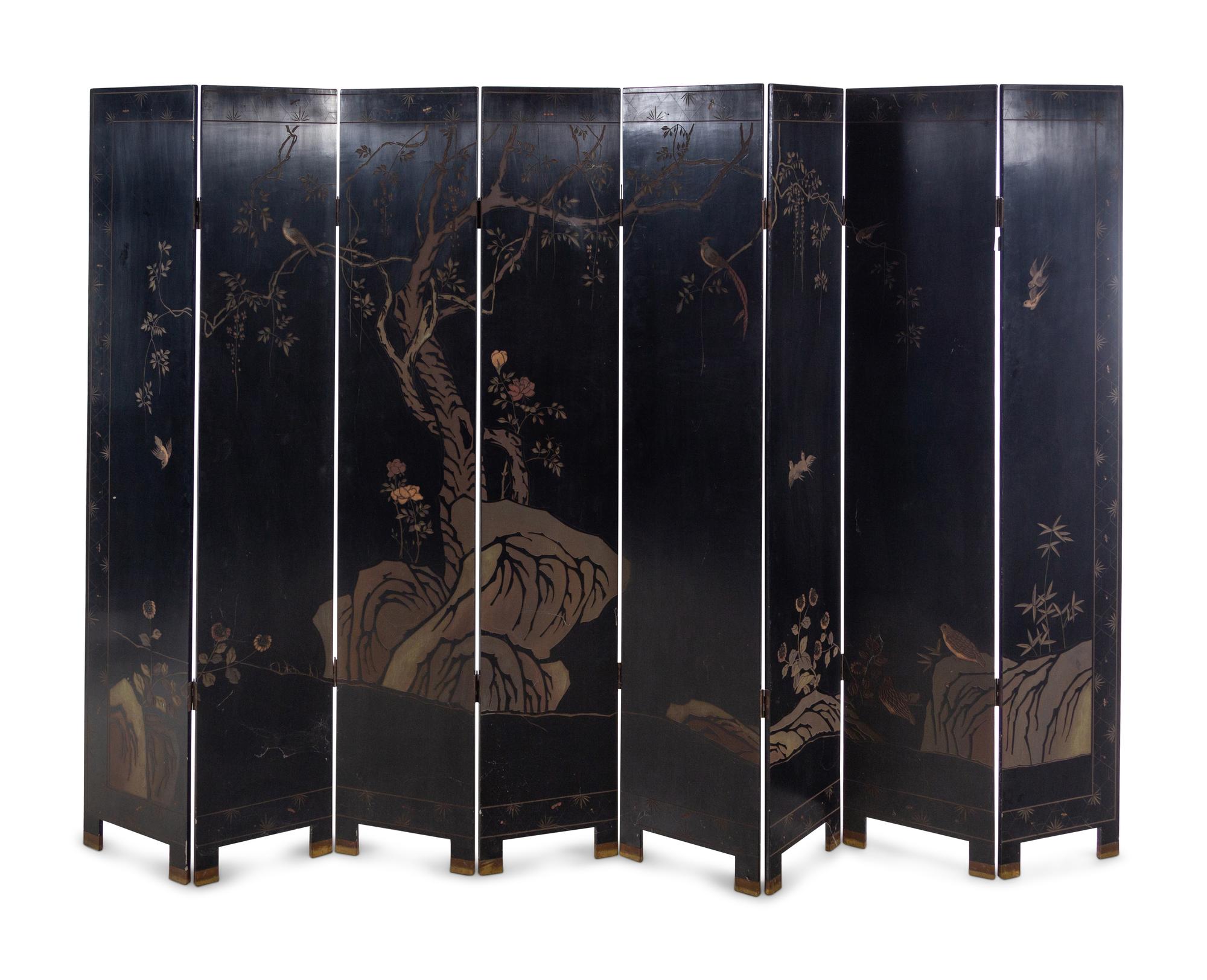 A Coromandel Lacquer Eight-Panel Floor Screen