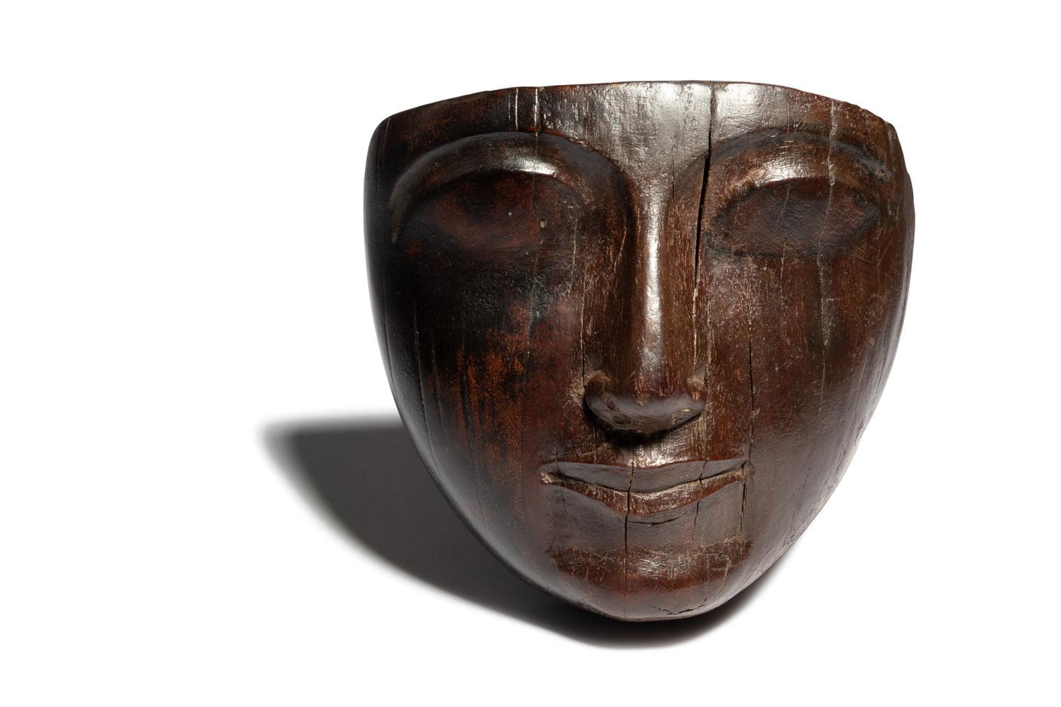 An Egyptian Wood Mummy Mask