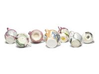 Seven Lusterware Creamers and Pitchers