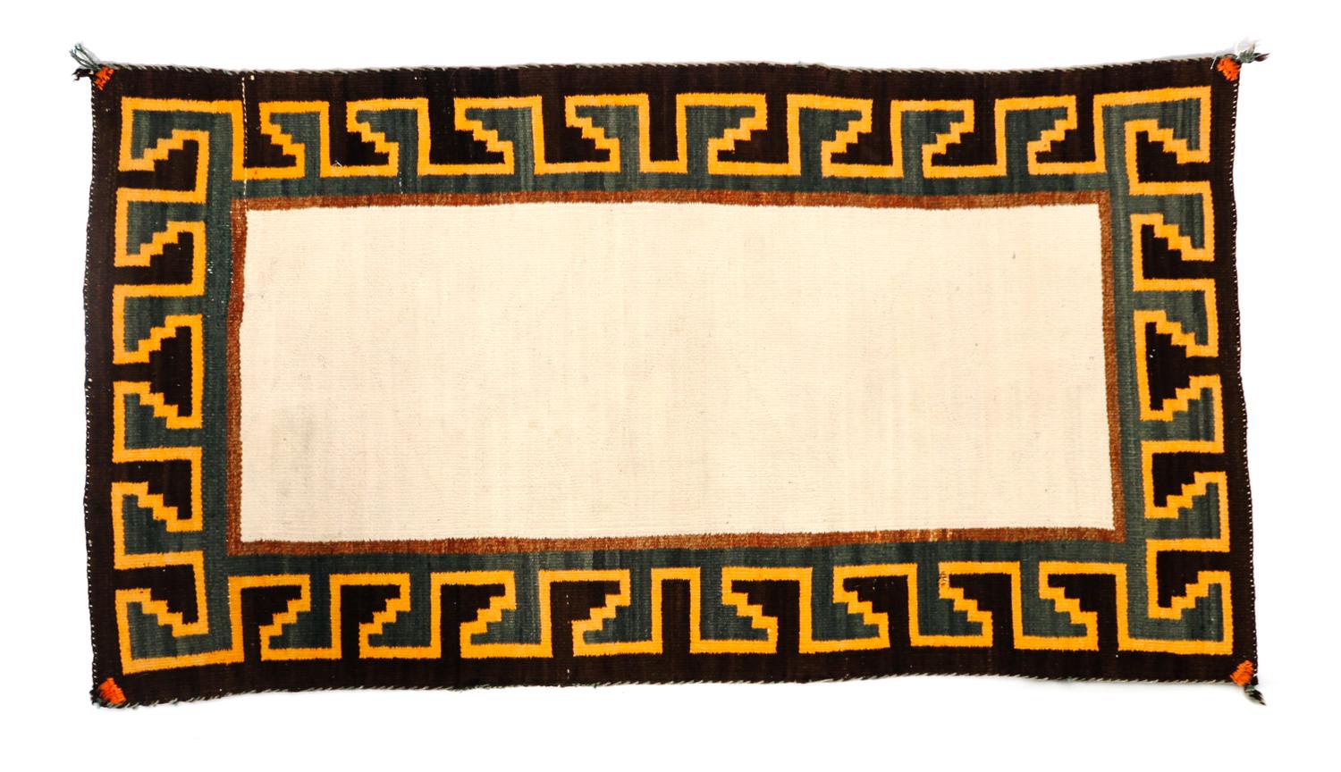 A Navajo Double Sided Saddle Blanket 52 1/2 x 28 inches. — CIRCA 1910