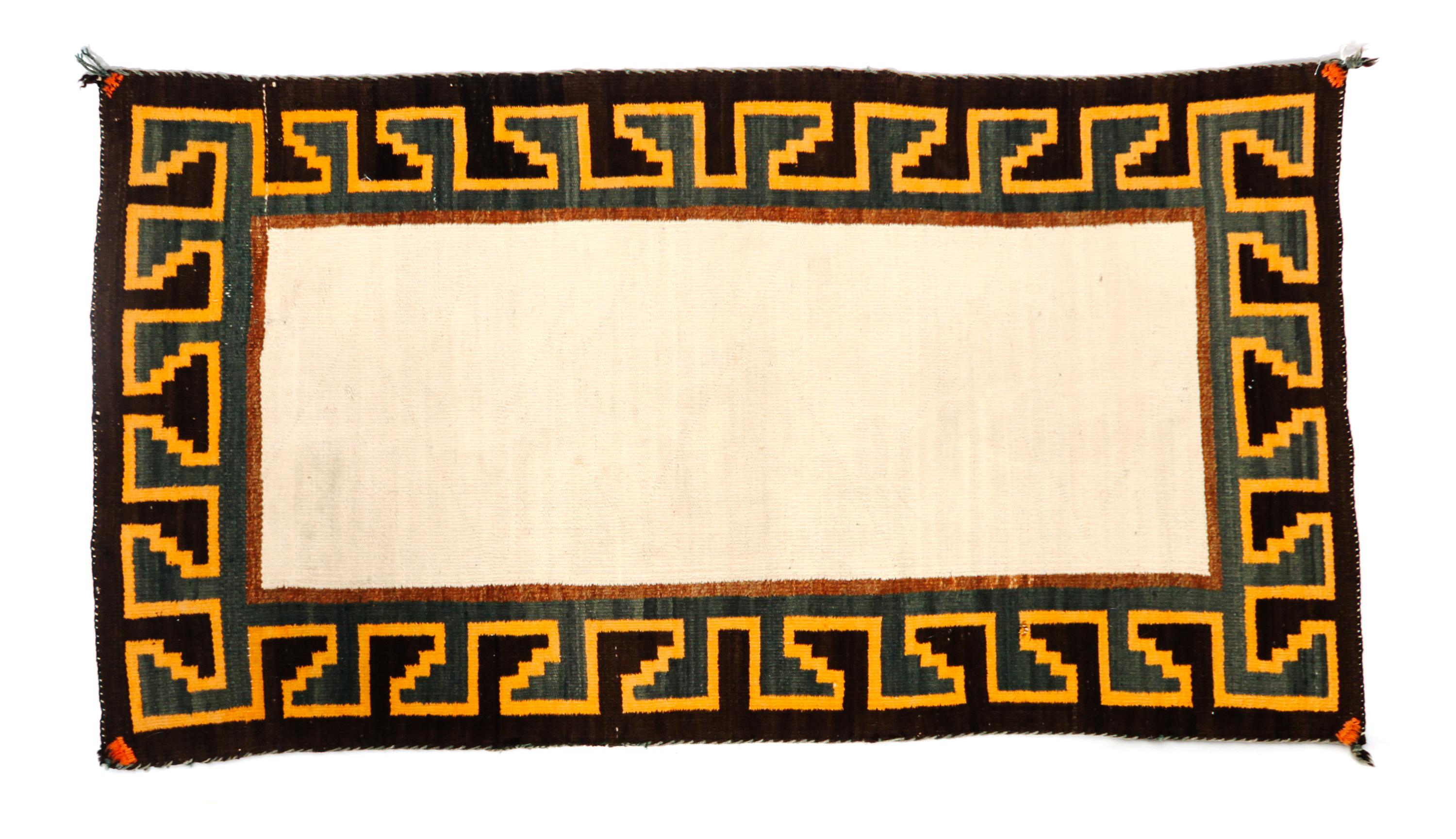 A Navajo Double Sided Saddle Blanket 52 1/2 x 28 inches. — CIRCA 1910