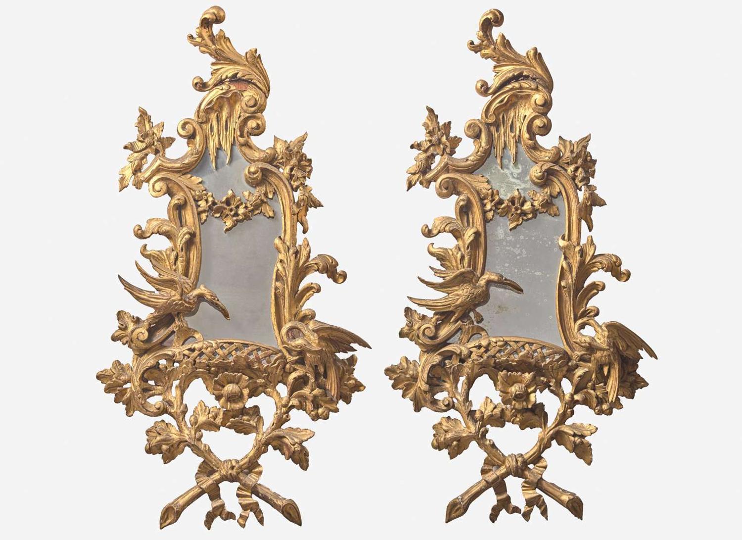 A pair of George III Rococo style giltwood mirrors, 20th century