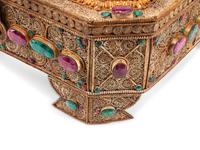 An Emerald and Ruby Mounted Silvered Metal Filigree Box