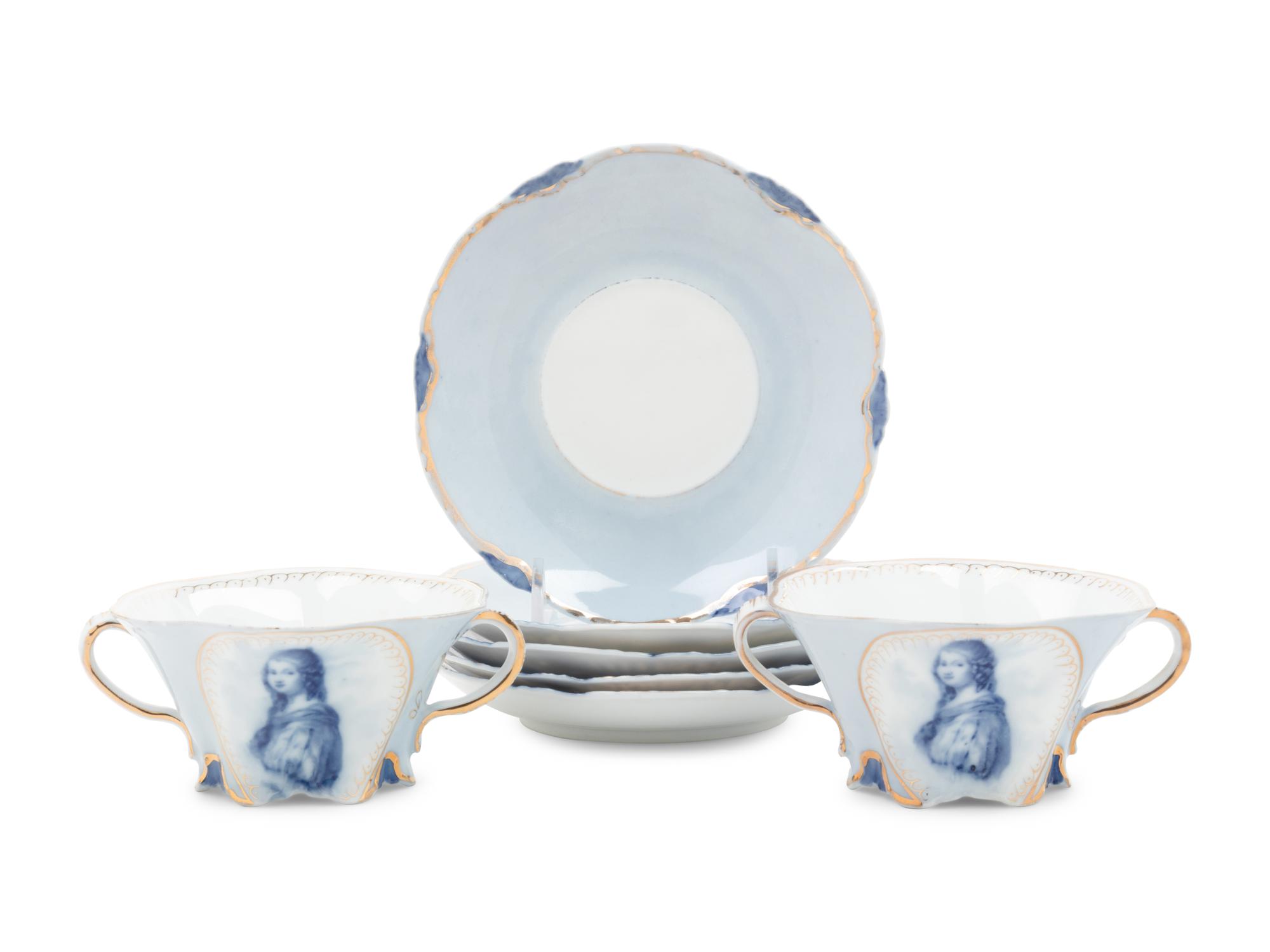 A Set of German Porcelain Teacups and Saucers