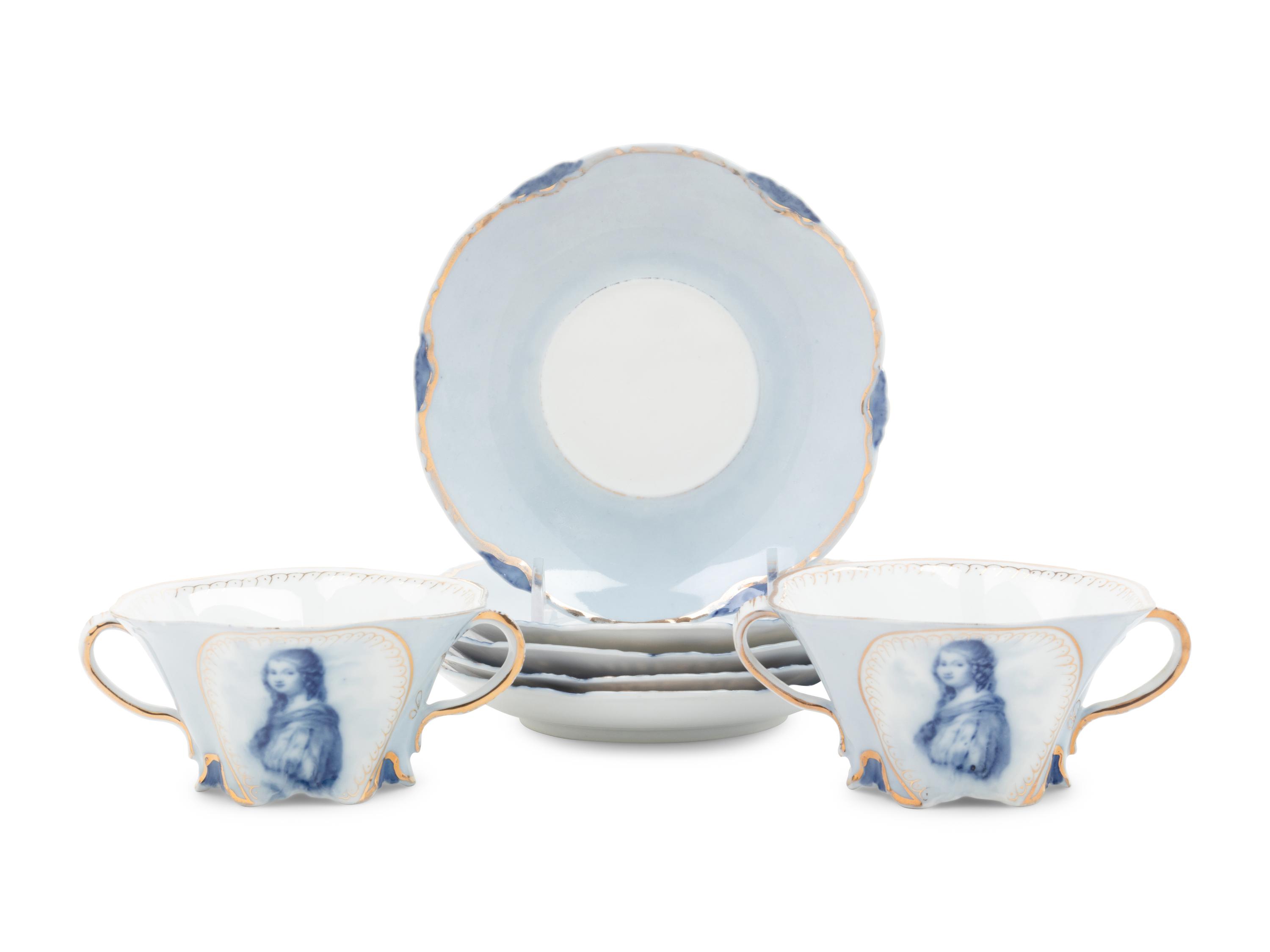 A Set of German Porcelain Teacups and Saucers