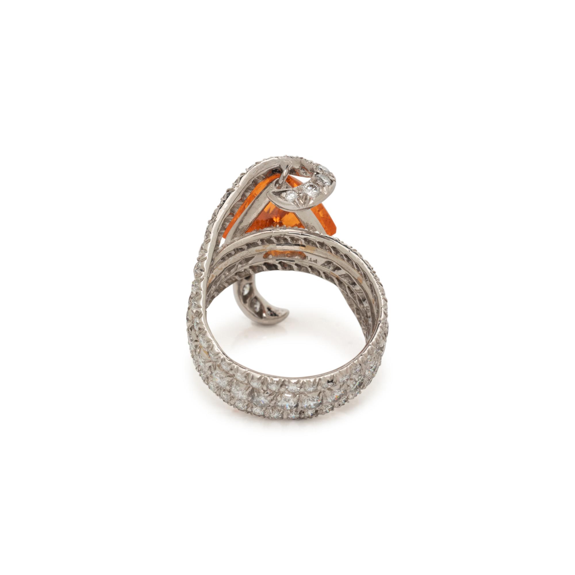 ORANGE GARNET, DIAMOND, AND PLATINUM RING