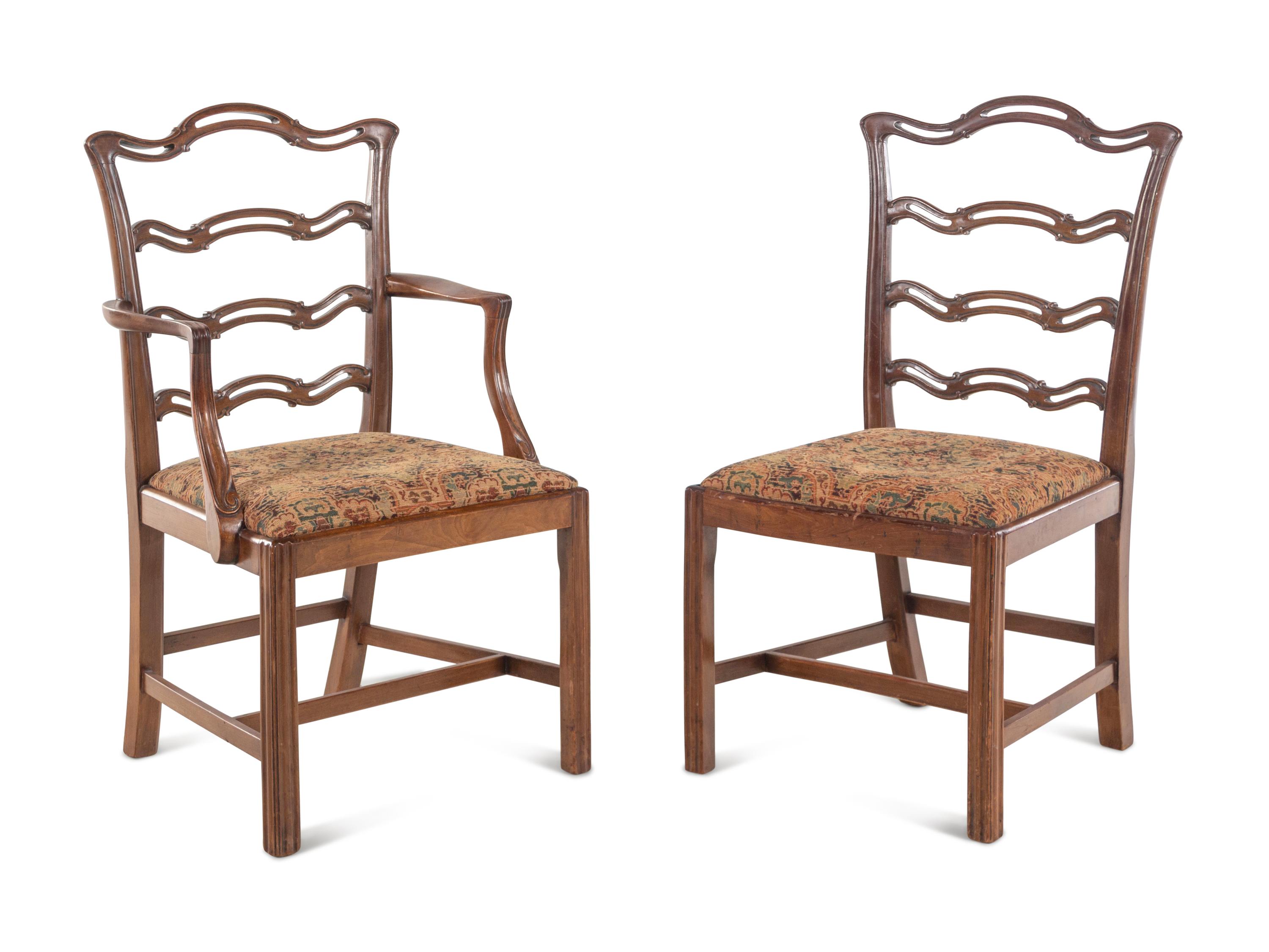 A Set of Eight George III Style Mahogany Chairs