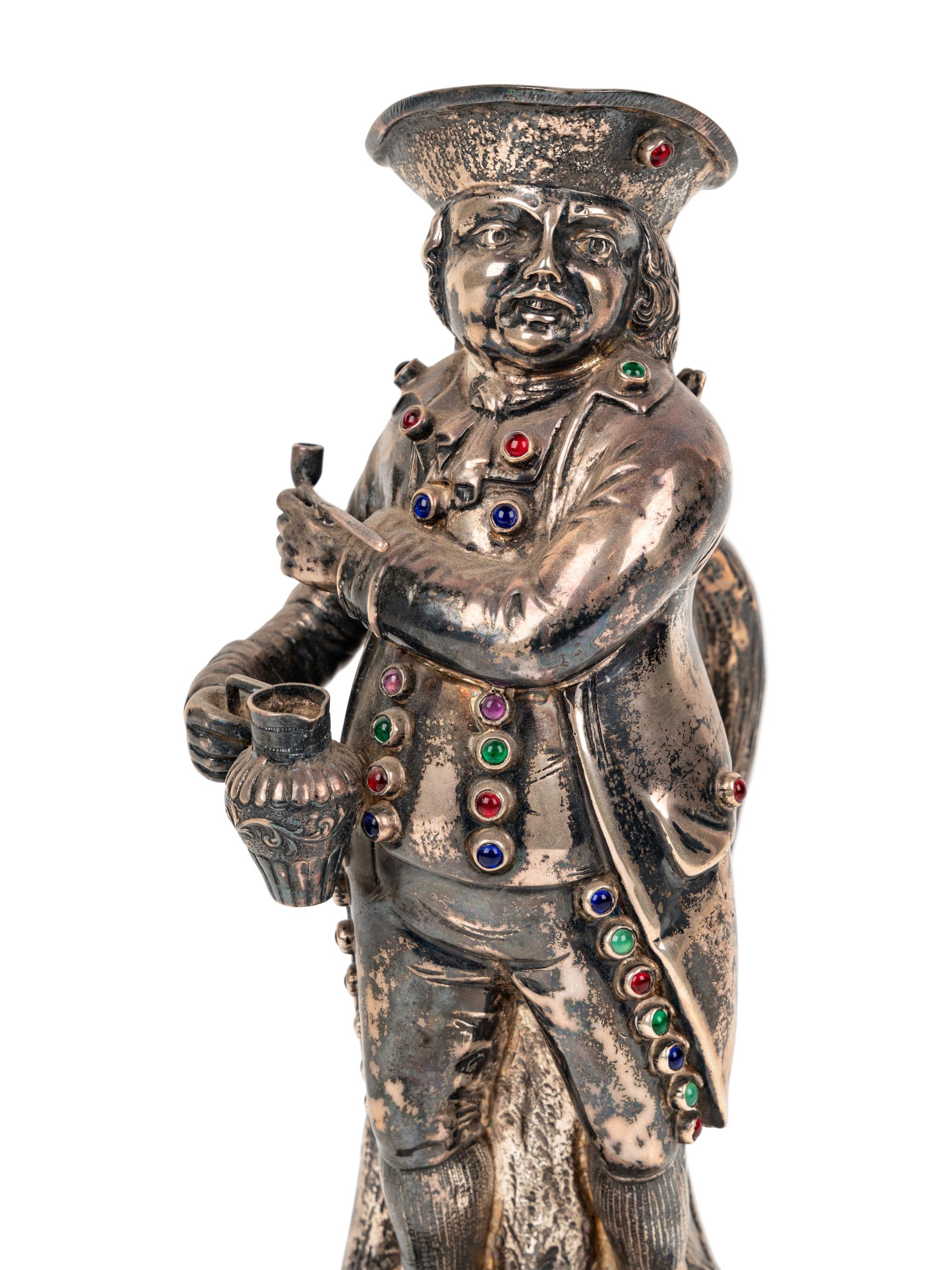 A Hanau Silver and Jewel-Inset "Hearty Good Fellow" Jug