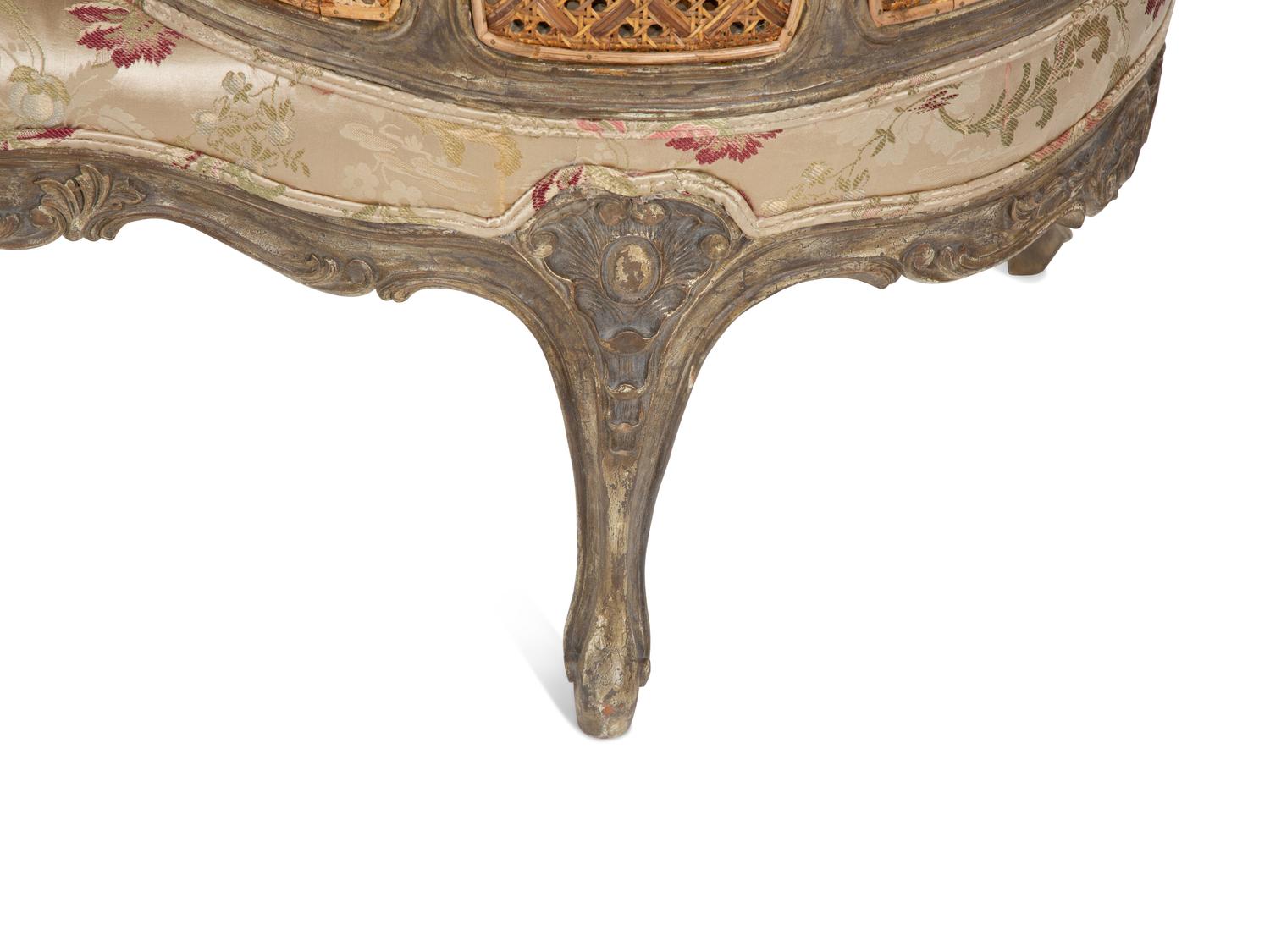 A Louis XV Style Painted Cane Back Tete-a-Tete
