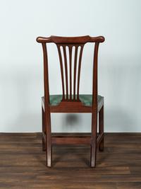 A Set of Six Chippendale Volute-Carved Mahogany Side Chairs