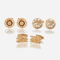 A collection of three fourteen karat gold cufflinks