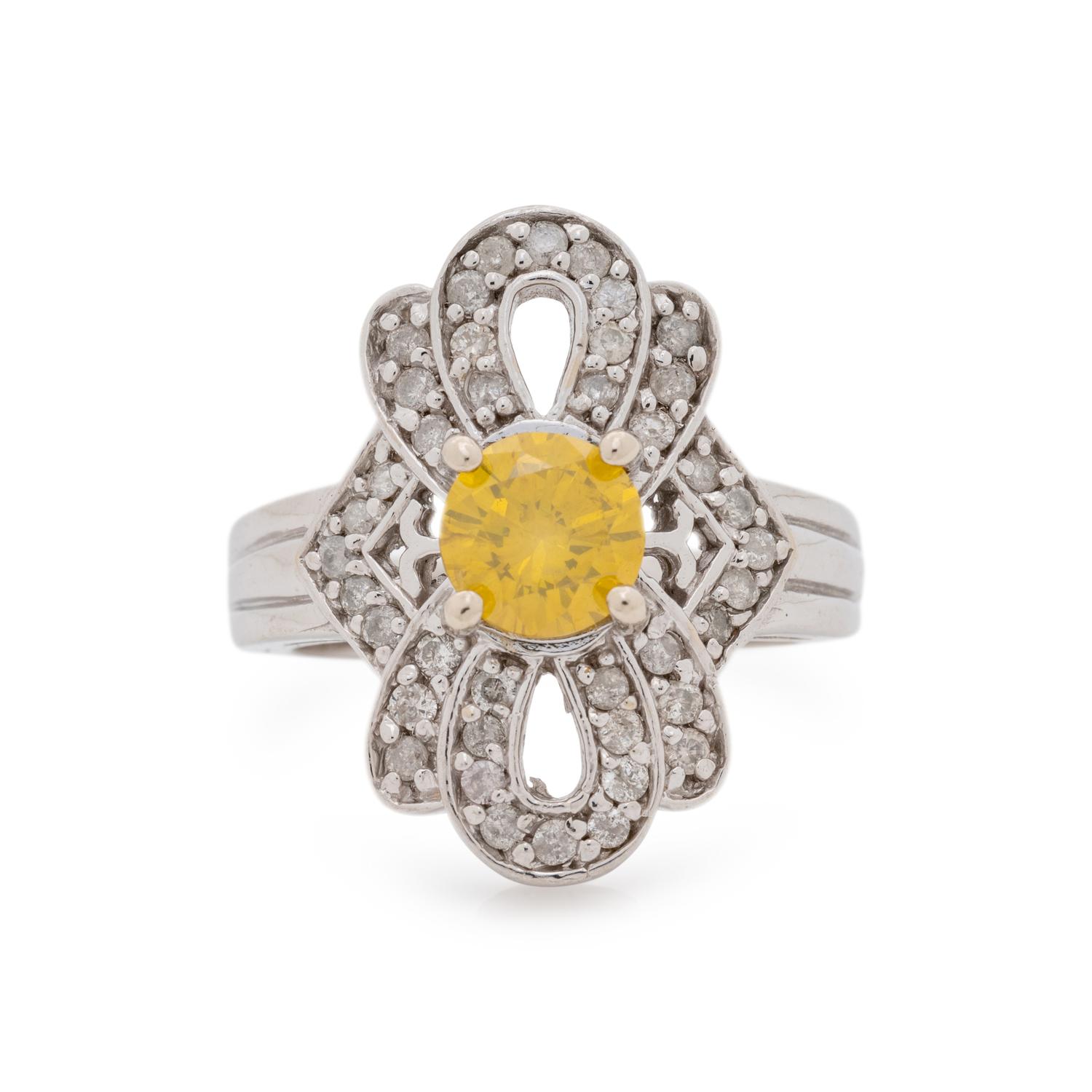 WHITE GOLD, TREATED YELLOW DIAMOND AND DIAMOND RING