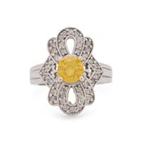 WHITE GOLD, TREATED YELLOW DIAMOND AND DIAMOND RING