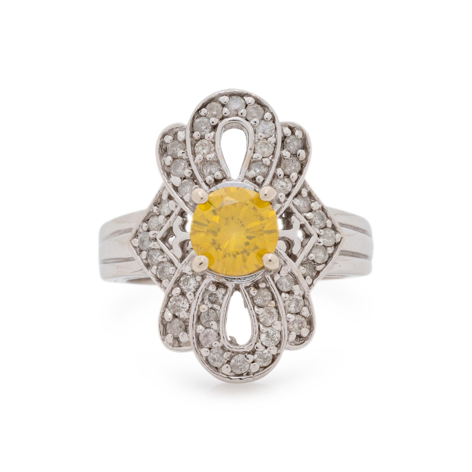 WHITE GOLD, TREATED YELLOW DIAMOND AND DIAMOND RING