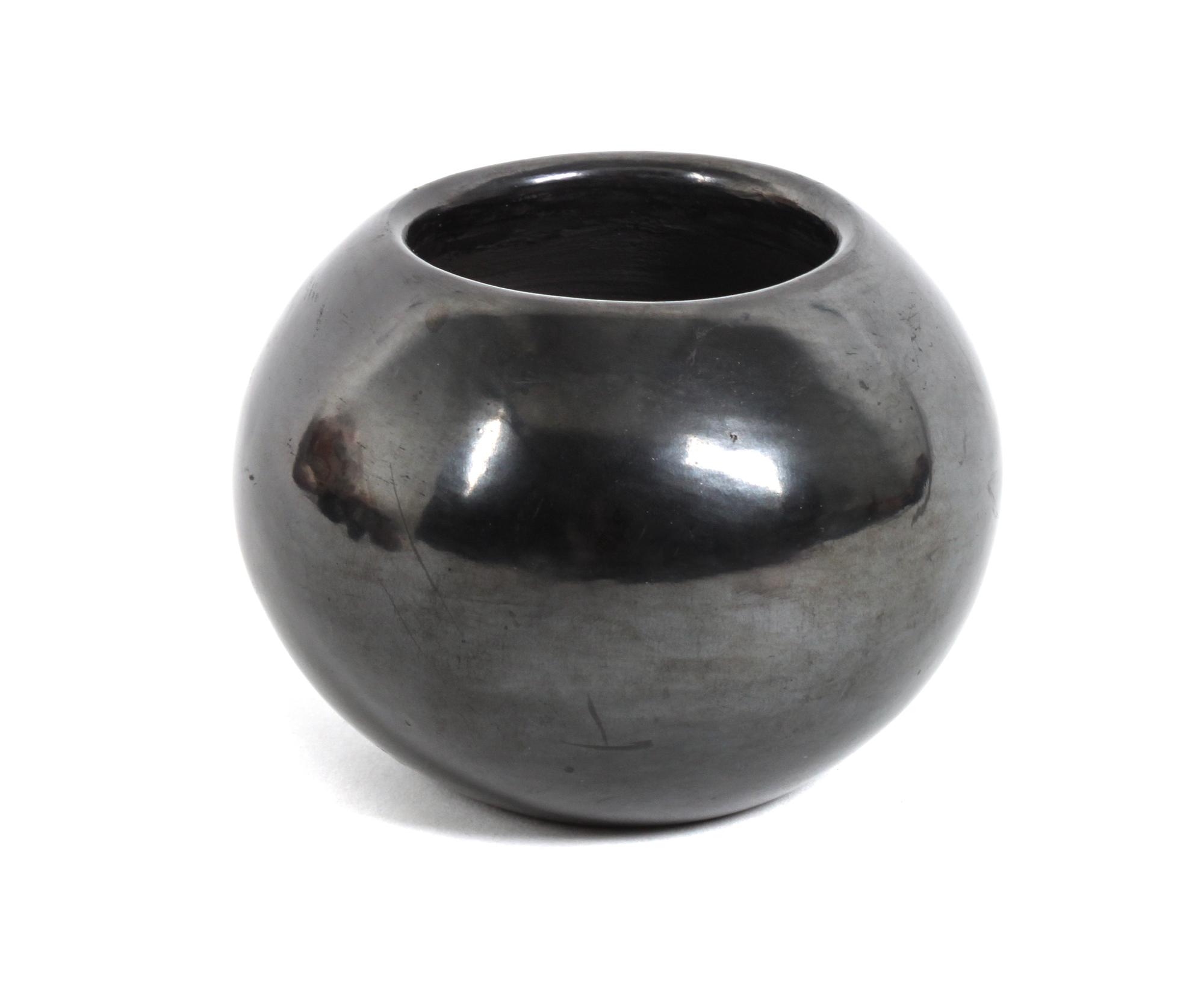 Maria Poveka Martinez (1887-1980), San Ildefonso Height 3 x diameter 4 inches.