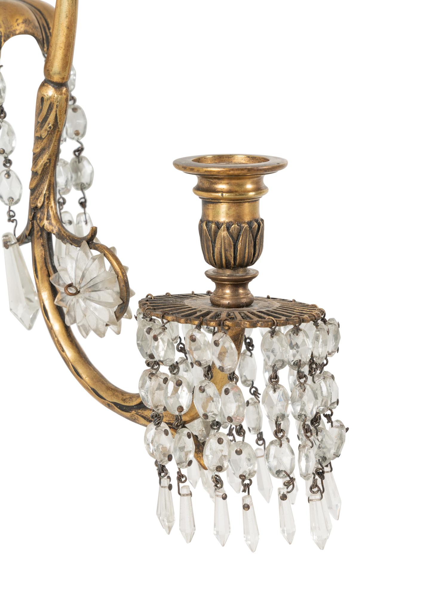 A Pair of Regency Style Gilt Metal and Glass Two-Light Sconces