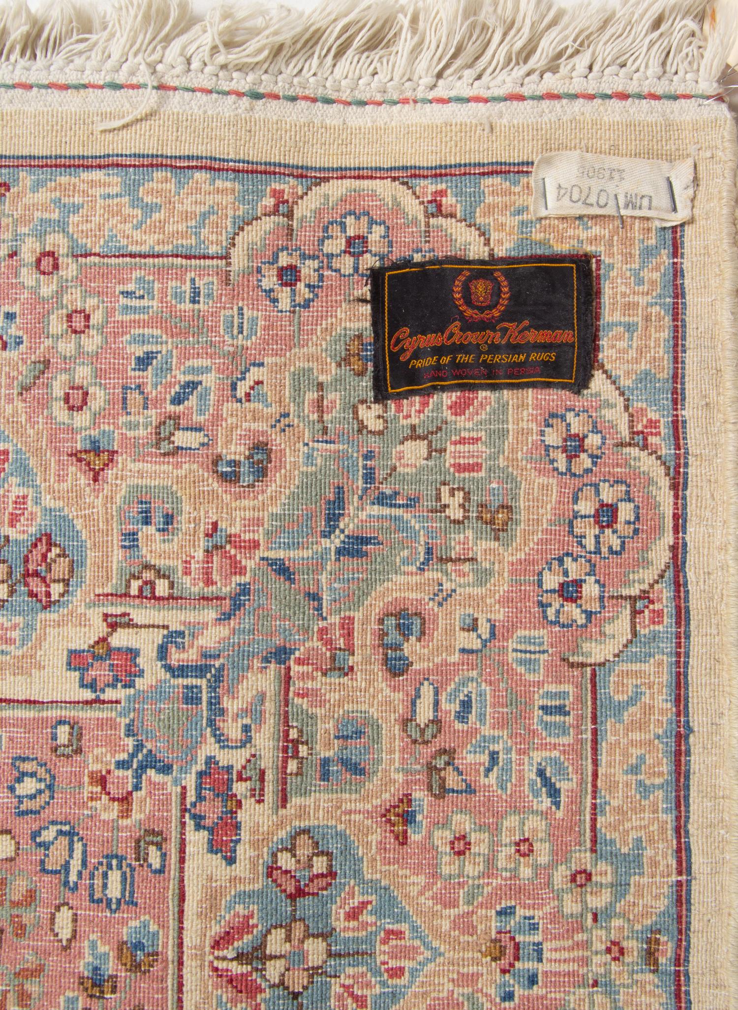 A Pair of Kirman Wool Rugs