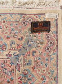 A Pair of Kirman Wool Rugs