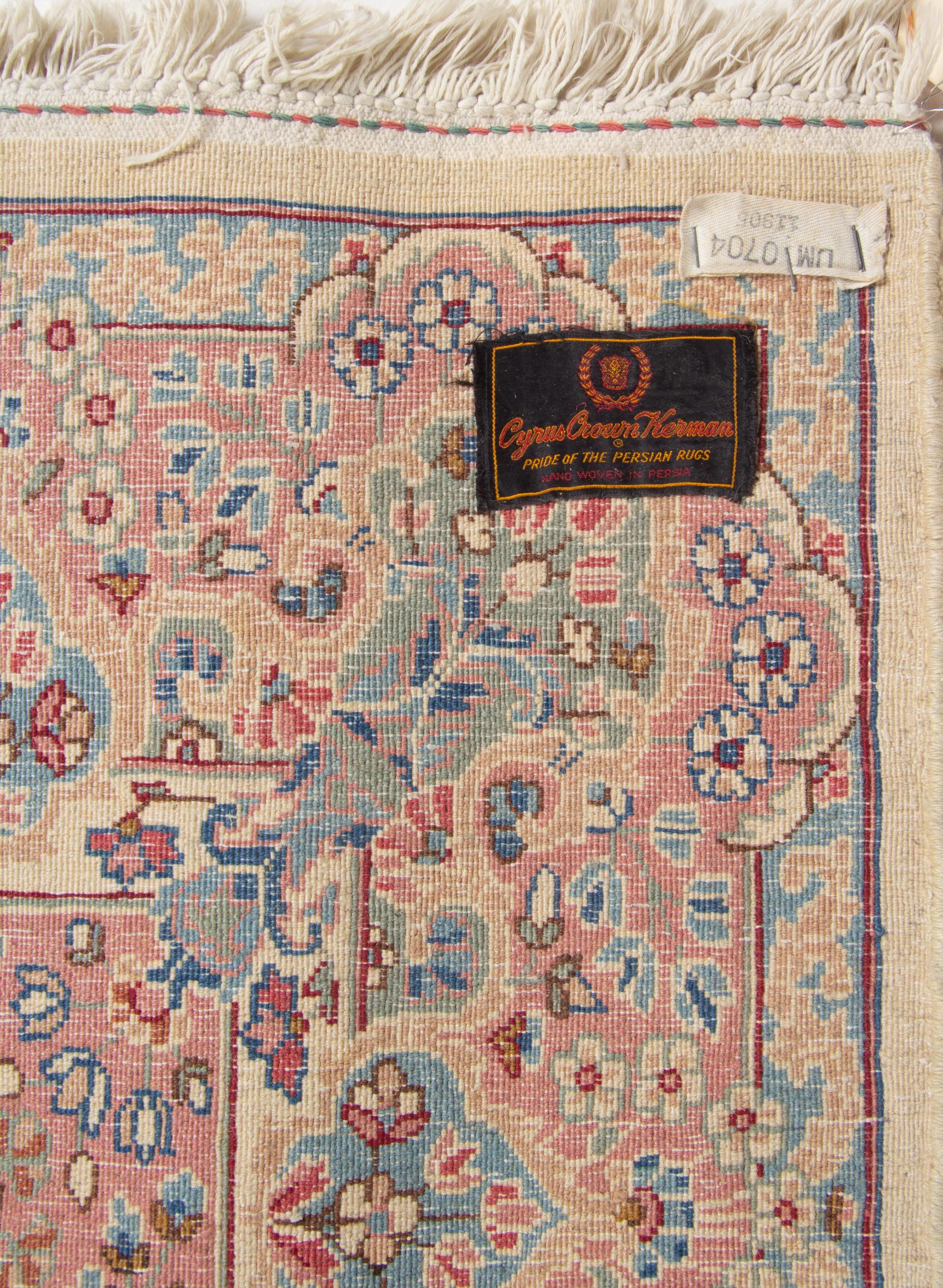 A Pair of Kirman Wool Rugs