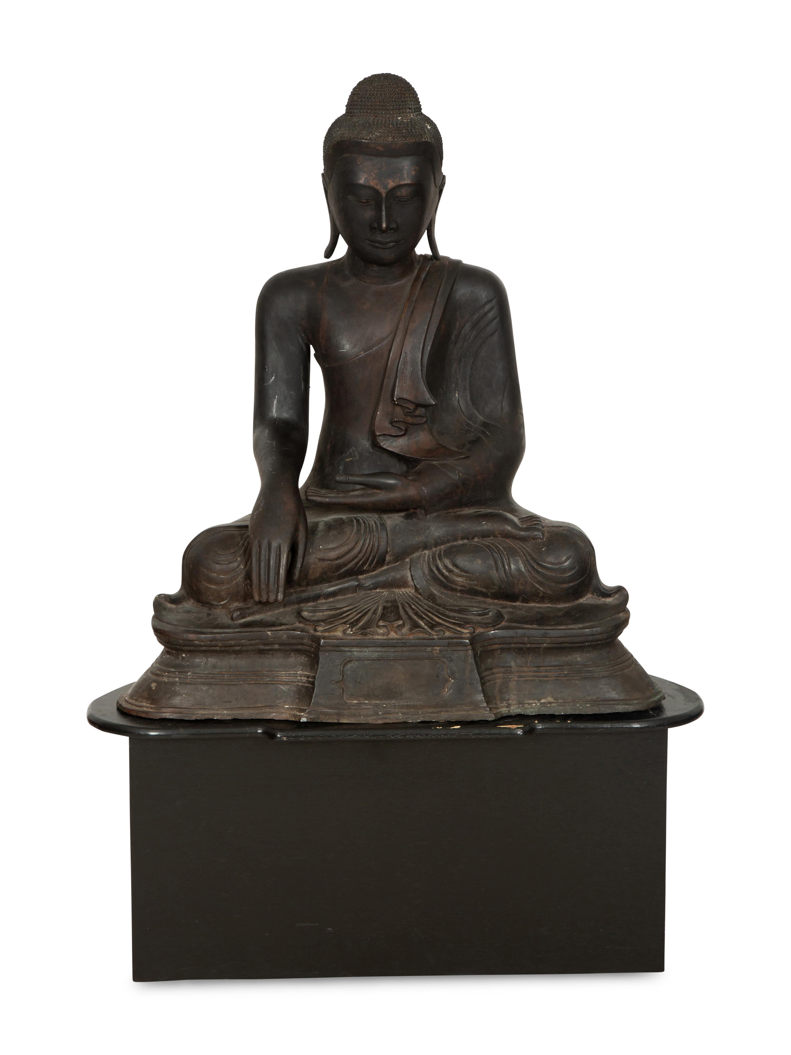A Large Southeast Asian Bronzed Metal Seated Buddha