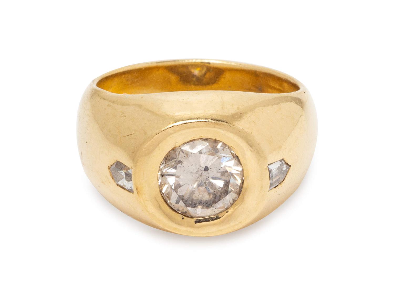A 14 Karat Yellow Gold and Diamond Ring,