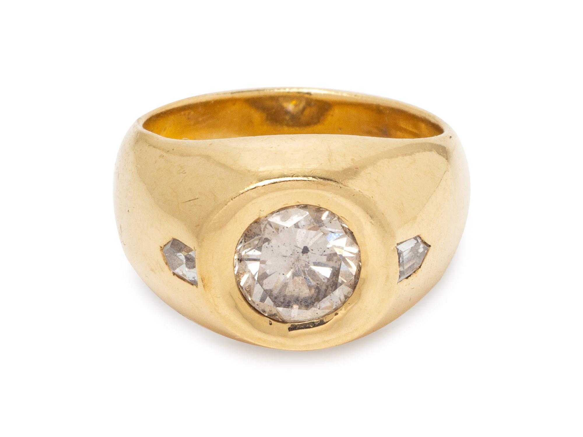 A 14 Karat Yellow Gold and Diamond Ring,
