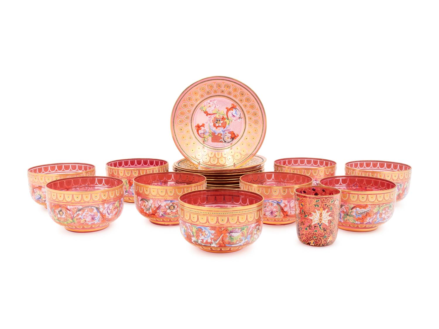 A Set of Nine Murano Parcel-Gilt and Enamel Decorated Colored Glass Dessert Bowls and Underplates