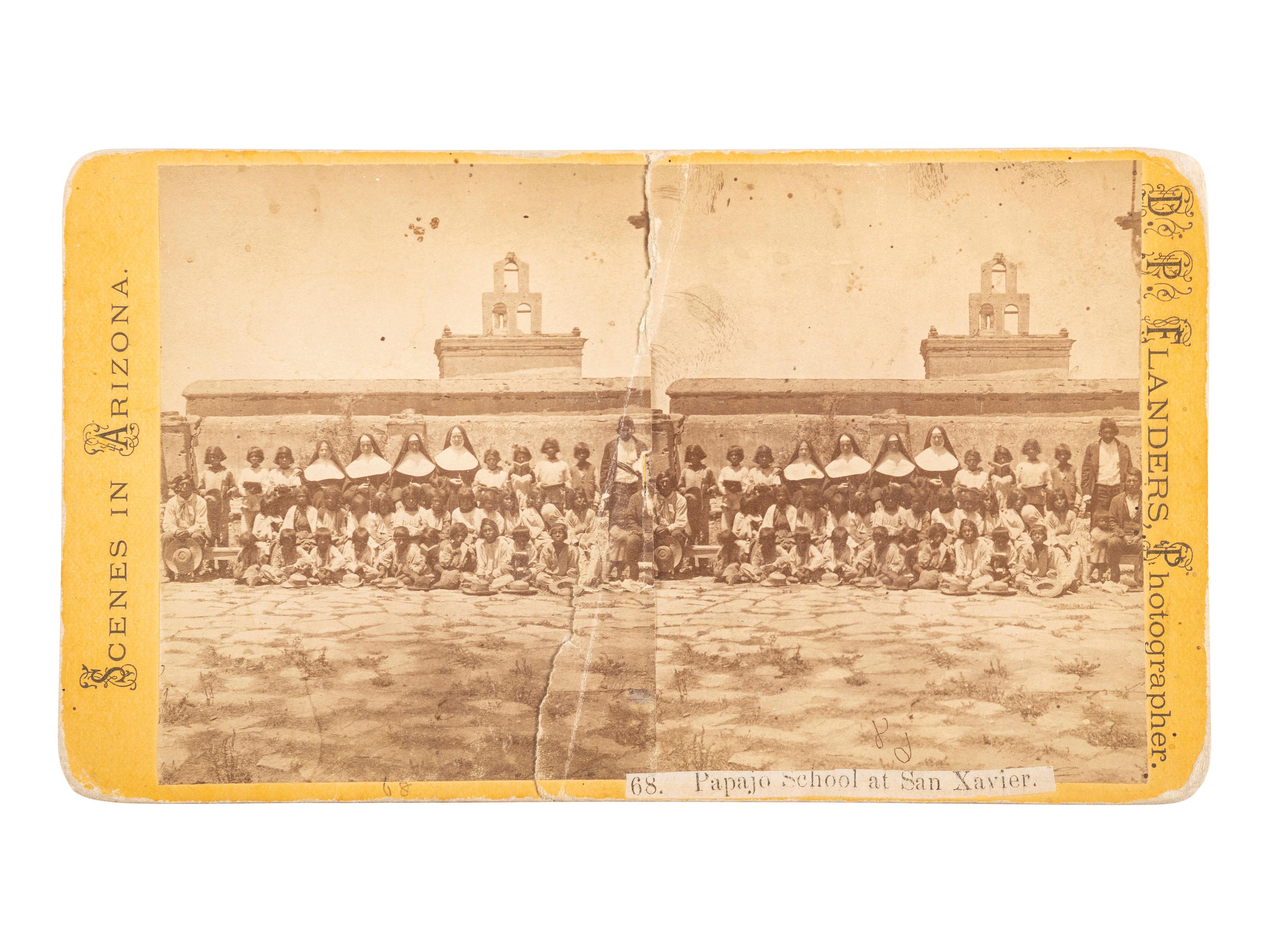 [NATIVE AMERICANS]. FLANDERS, D.P., photographer. Stereoview of Papago School of San Xavier. Tucson, Arizona. [Ca 1874].
