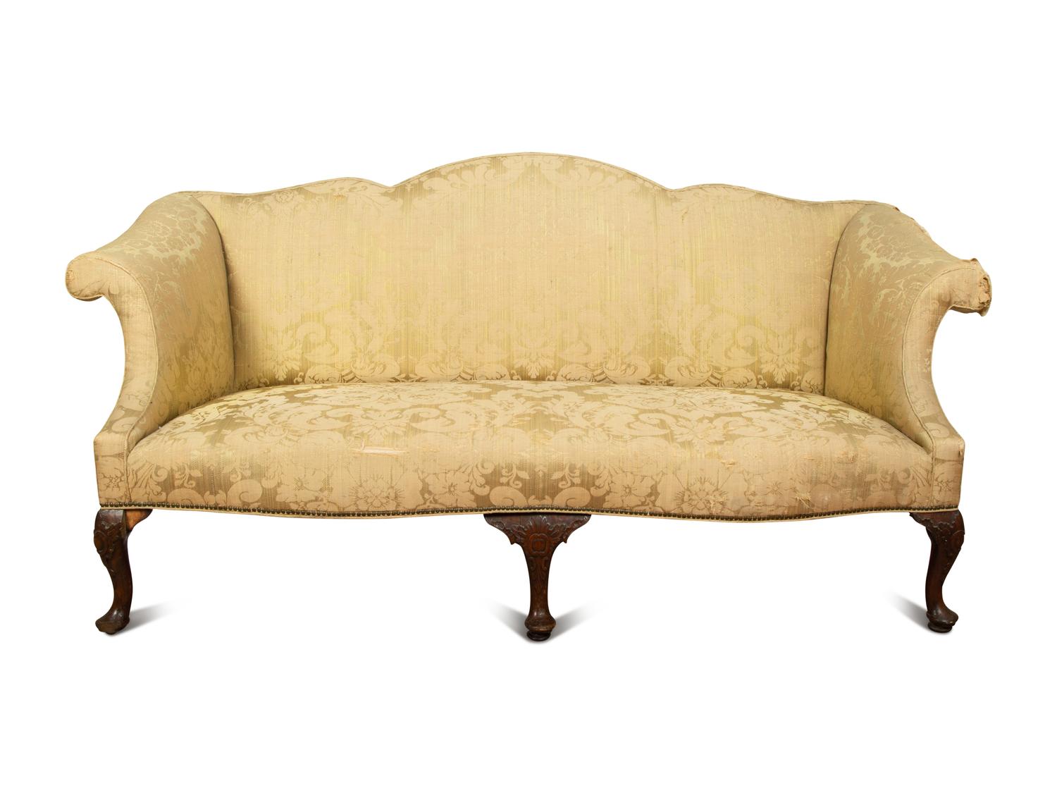 A George III Mahogany Camelback Sofa — 18TH/19TH CENTURY