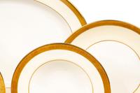 A Minton Buckingham Porcelain Dinner Service